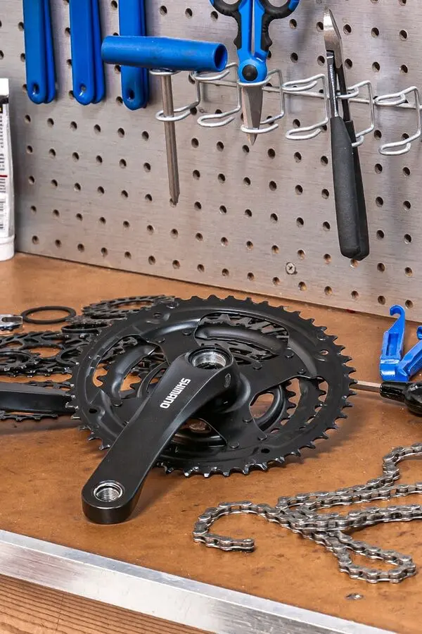 Bike tools and components on workbench